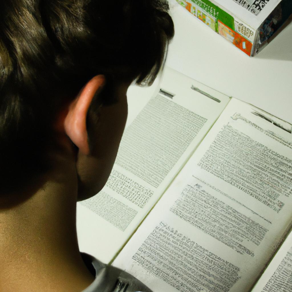 Person reading educational materials, studying